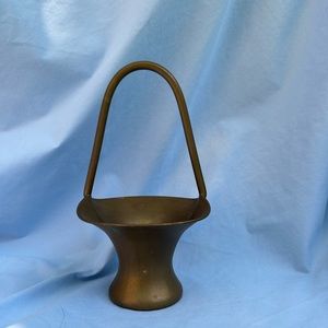 Brass basket with handle.